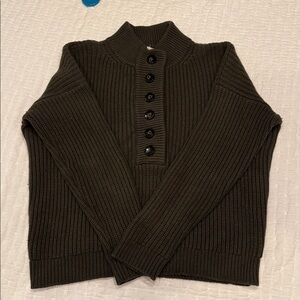 Sezane Lucas olive green sweater with black buttons. Slightly high neckline.